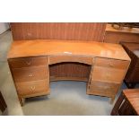 Mid 20th century oak finish inverted bow desk/bedside cabinet of 6 drawers In need of attention