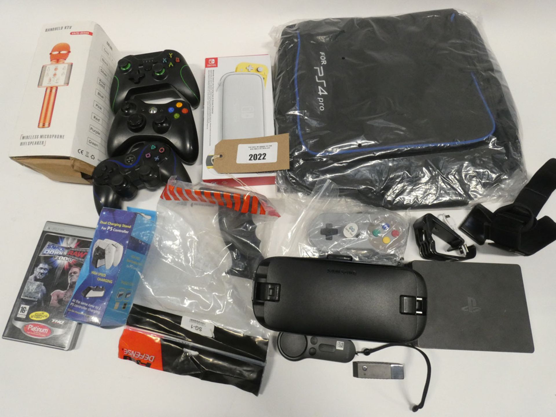 Bag containing quantity of gaming accessories; PS4 VR unit, Samsung VR headset, controllers, PS4 Pro