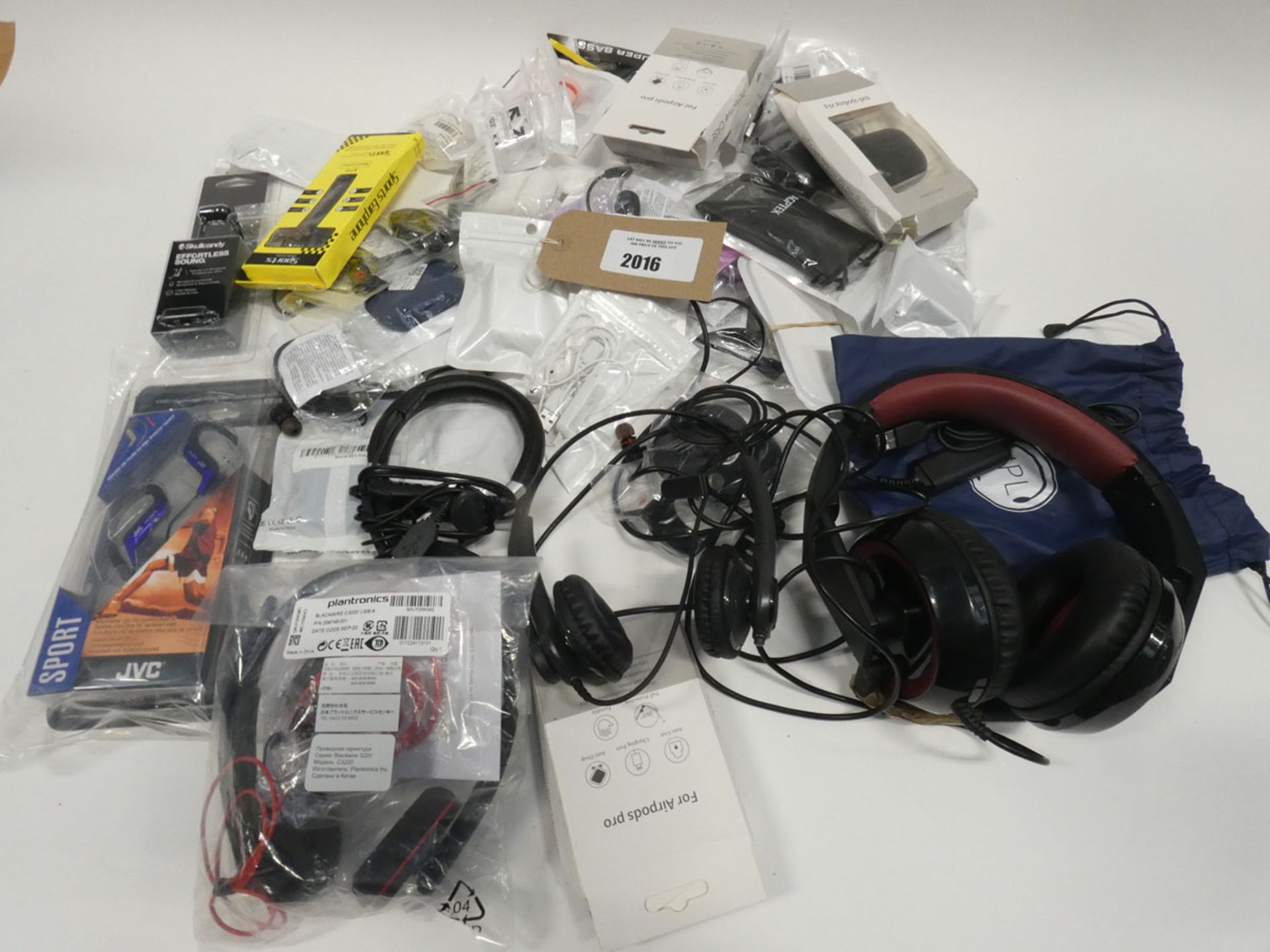 Bag containing various headsets, earphones and earphone accessories