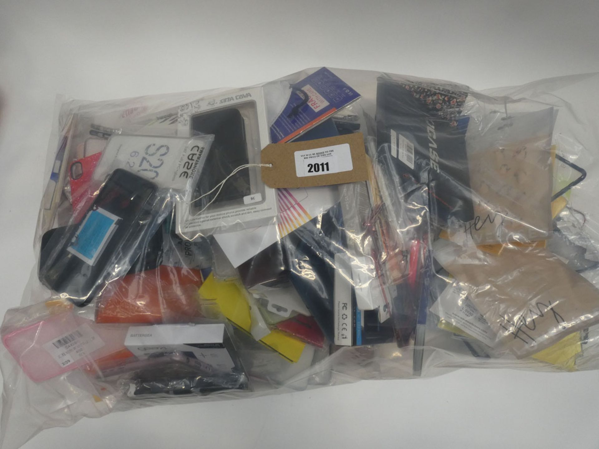 Bag containing quantity of mobile phone cases and covers