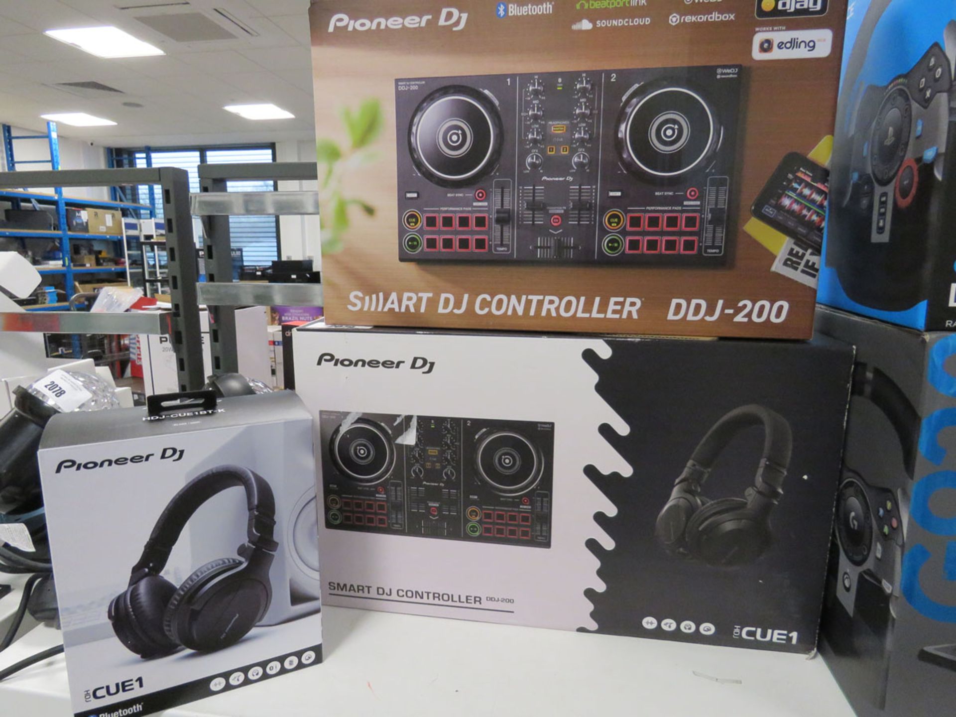 Pioneer Smart DJ controller model DDJ-200 with pair of HDJ Q1 headphones