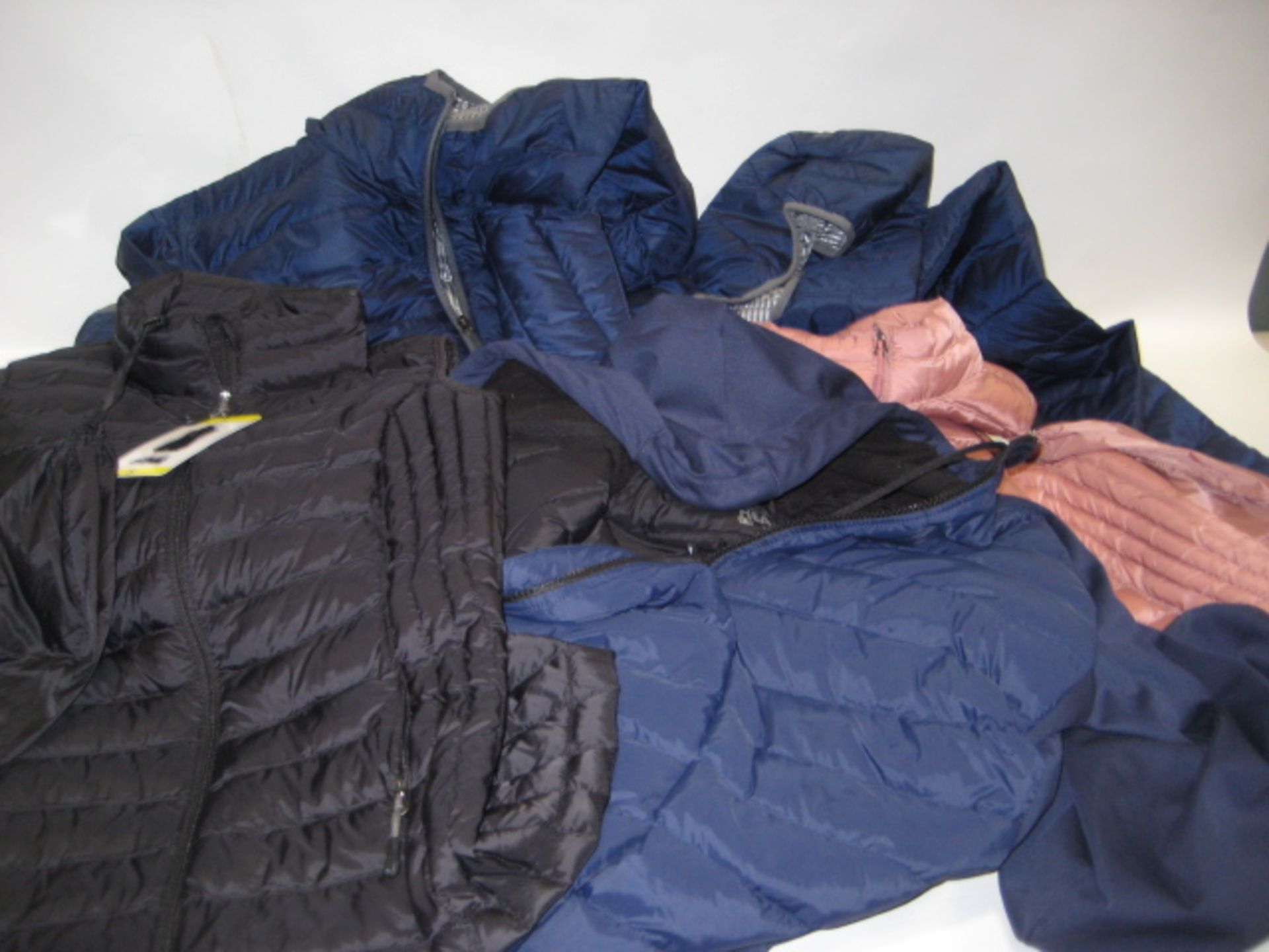 Three quilted coats by Columbia and 32 Degree heat together with 2 quilted gilets by 32 Degree Heat,