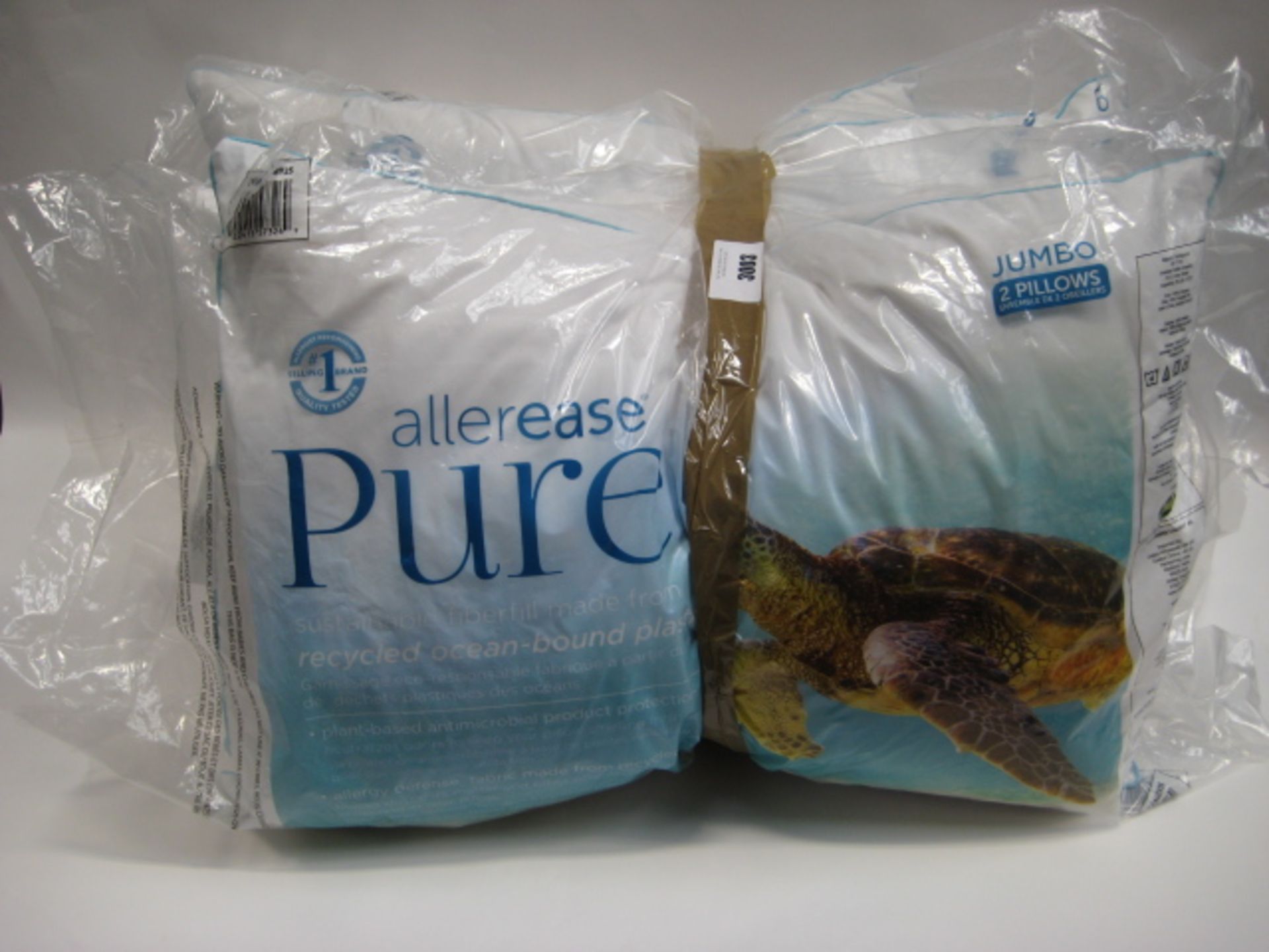 Three pillows by Aellerease Pure and a single pillow by Snuggle Down