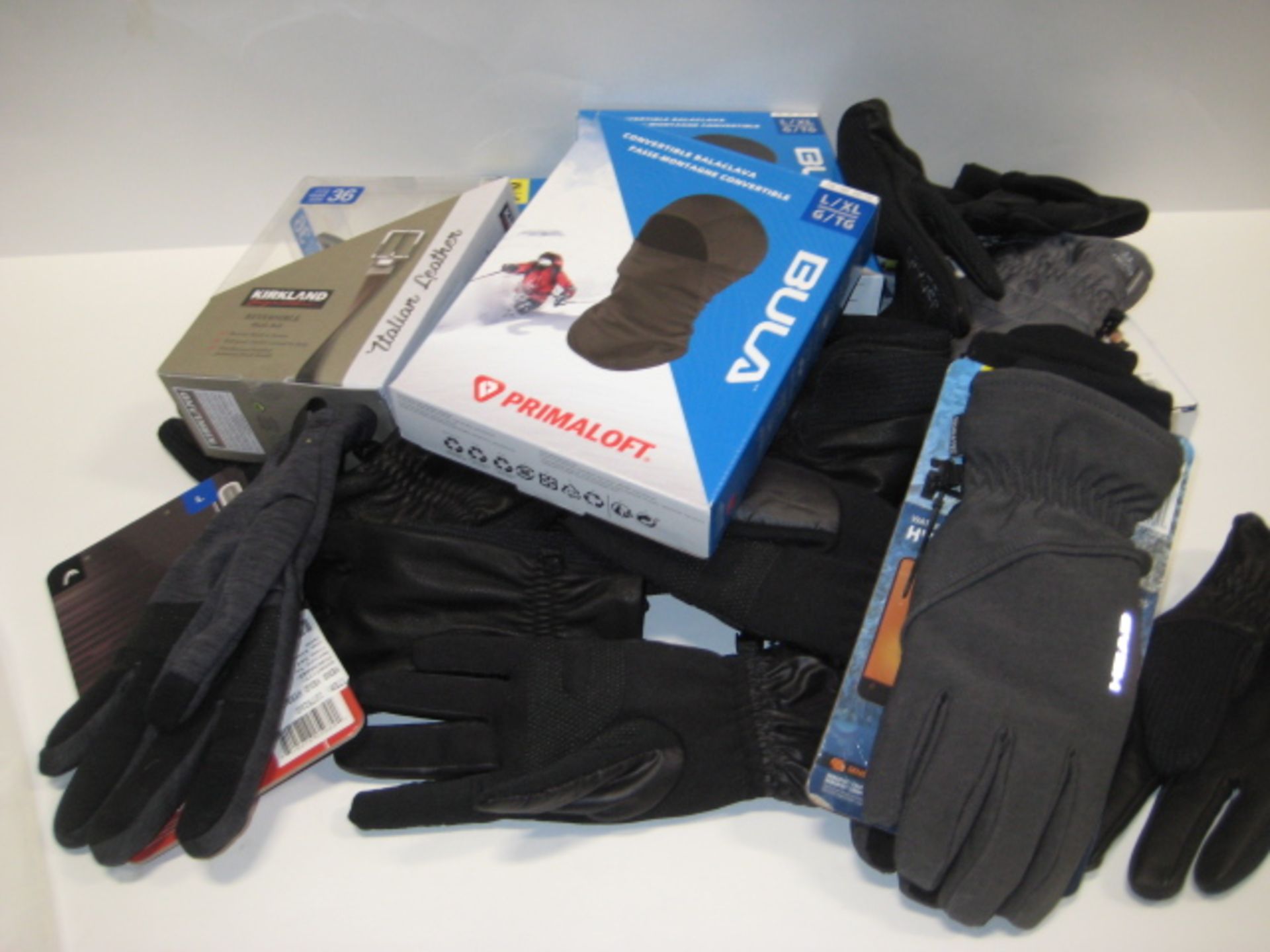 Bag containing boxed balaclava's, gloves, leather belt by Kirkland fitting thighs 36
