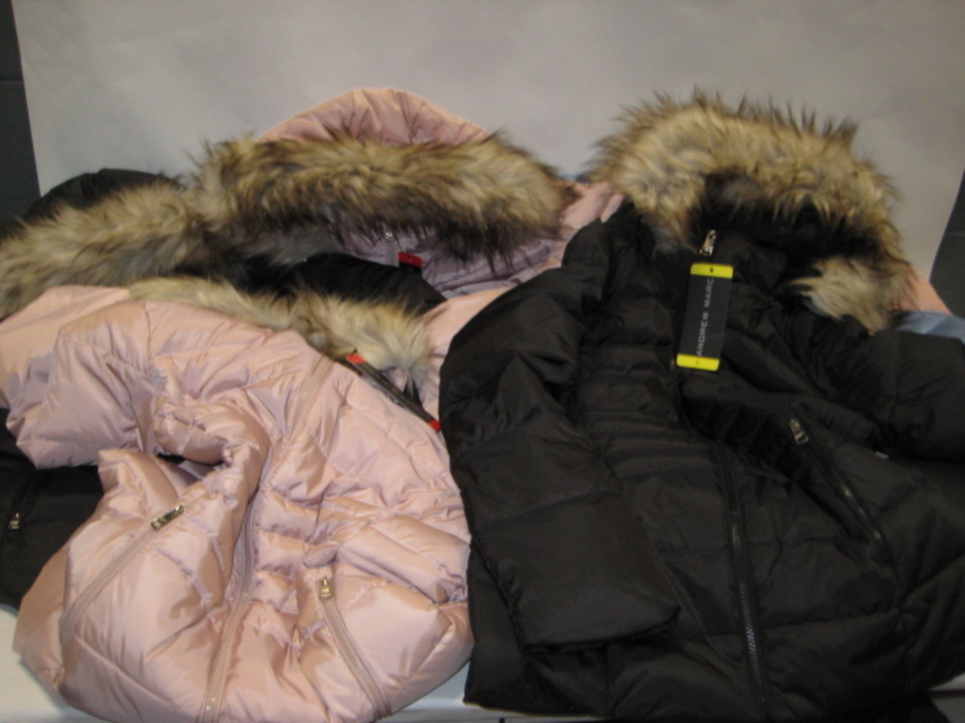 Six ladies coats by Andrew Mark with faux fur trim to the hood in black, light blue and pink,