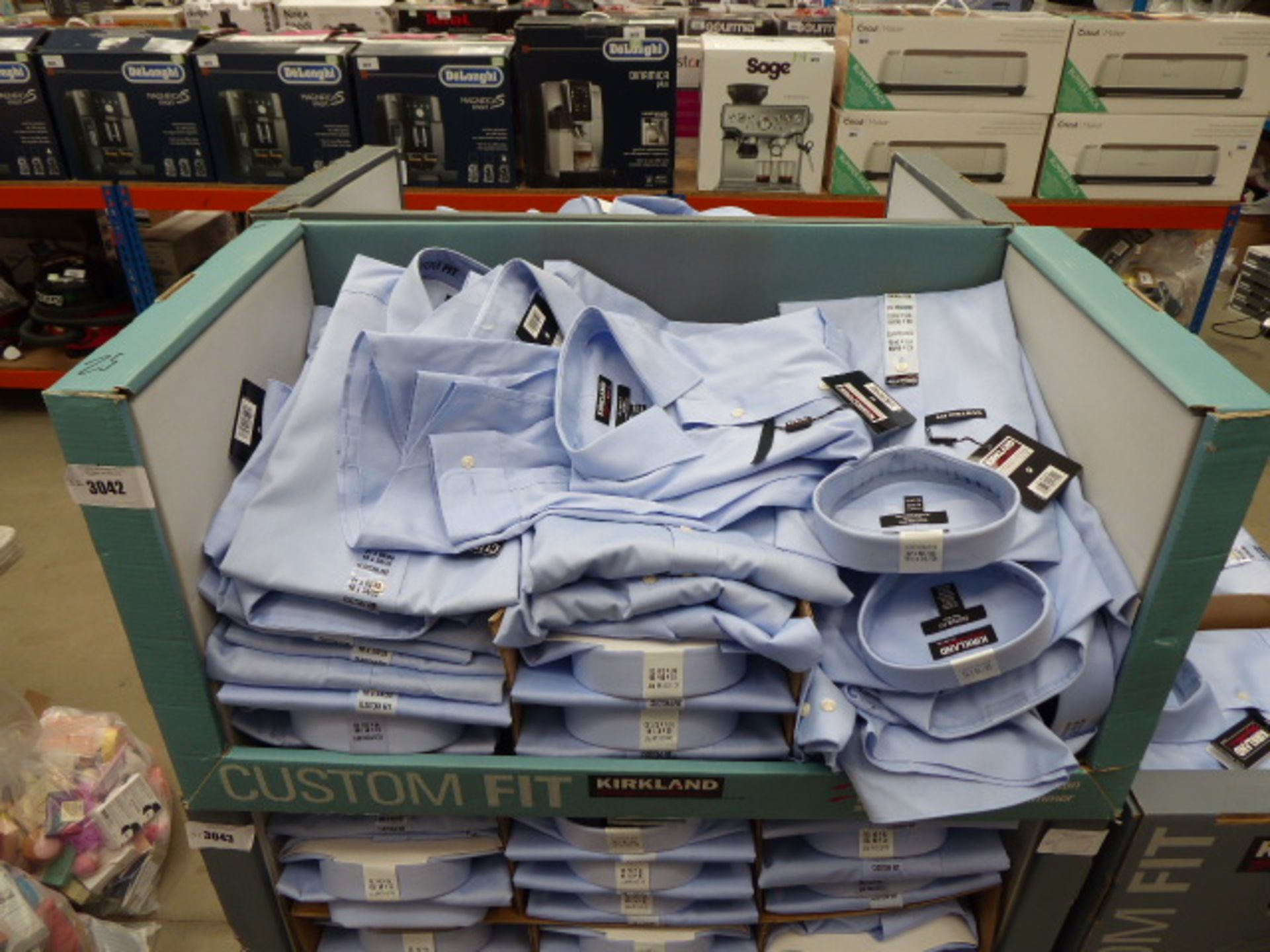 Tray containing approx 32 men's Kirkland custom fit shirts in light blue