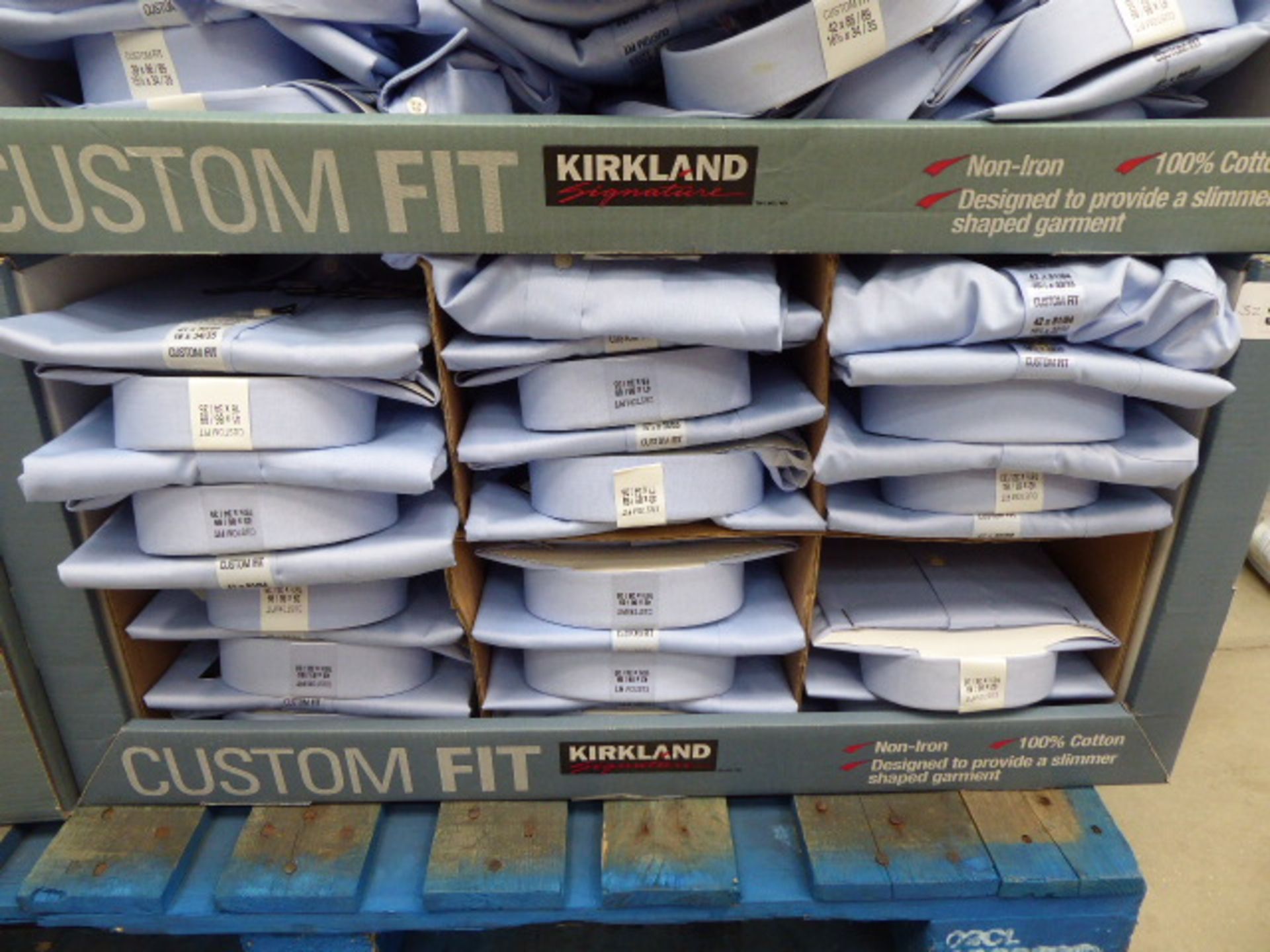 Tray containing approx 32 men's Kirkland custom fit shirts in light blue