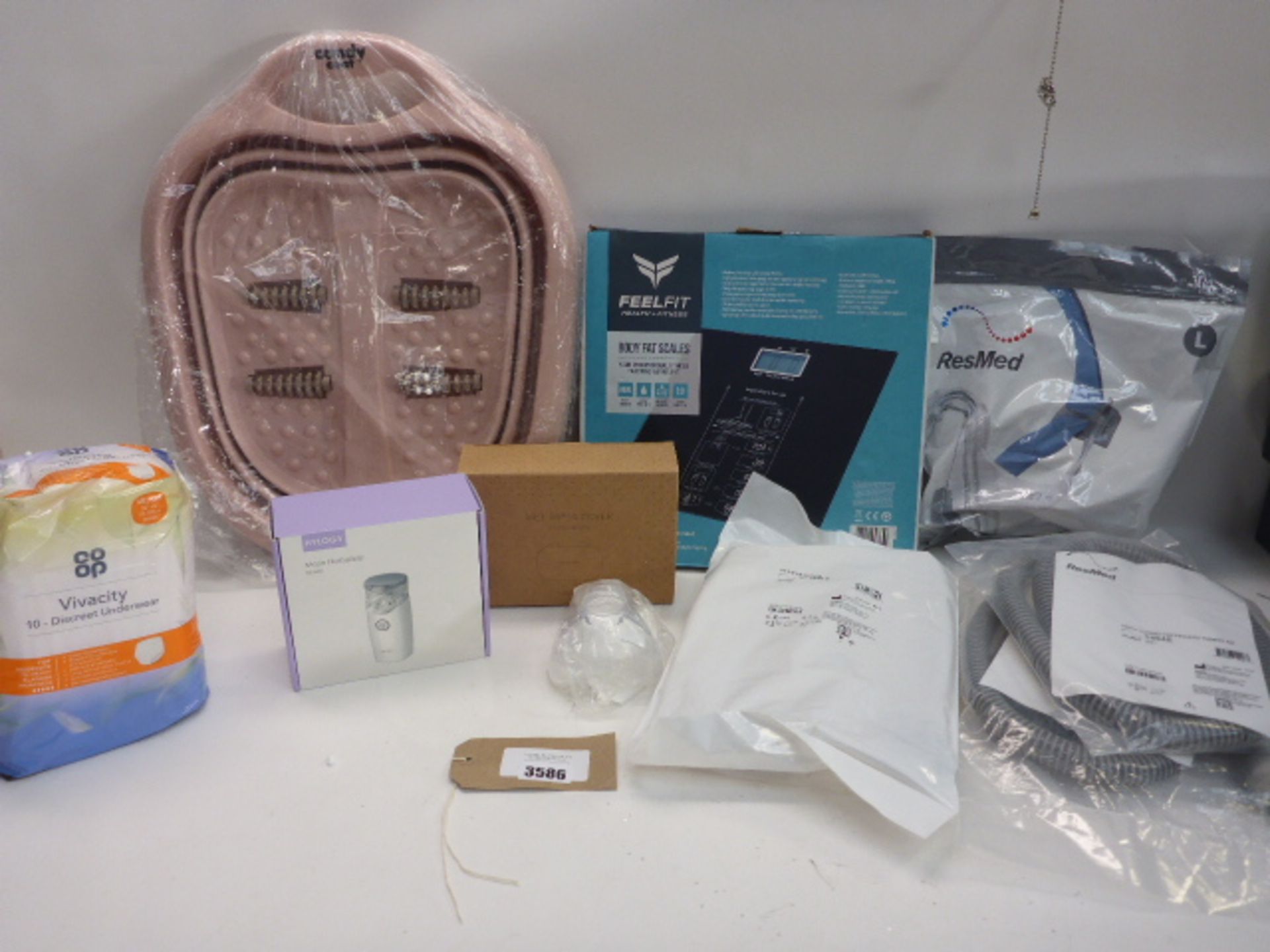 Candy Coat foot massager, Feel Fit body fat scales, ResMed face mask & tubing, discreet underwear,