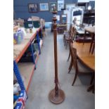 Turned wooden floor lamp