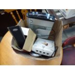 Box containing a CD player, tuner, Sega game plus speakers