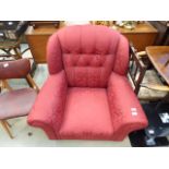 Red floral button back armchair