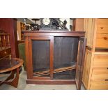 A Victorian mahogany two door bookcase, w. 107 cm Poor condition