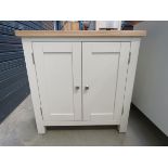 Cream painted oak top 2 door cupboard