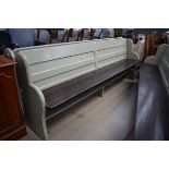 A pale green and brown painted pew, approx. l. 232 cm Typical minor wear