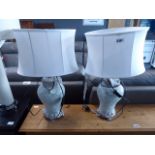 Pair of reflective crackle glazed and silver painted table lamps with cream shades