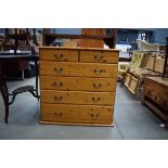 A modern pine finish chest of two short and four long graduated drawers, w. 85 cm