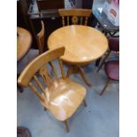 Circular beech table with 2 stick back chairs Diameter is 75cm