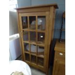 Cherry effect glazed single door bookcase