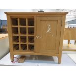 Oak sideboard with single cupboard door and wine bottle rack (50)