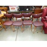 4 red rexine and beech dining chairs (see soft furnishings policy https://www.peacockauction.co.uk/