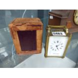 Carriage clock with brass case Item is working and has a key
