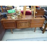 McIntosh double door sideboard with drawers to the side Damage to one door. Has been repaired and