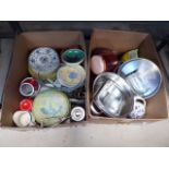 2 boxes containing stainless steel trays and pots plus kitchenware and general crockery