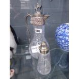 Claret jug and a sugar shaker No damage apart from one small bubble in the glass, the silver plate