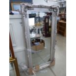 Rectangular bevelled mirror in silver painted frame (a/f)