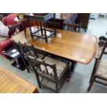 Oak refectory style table plus 6 chairs to include 2 carvers