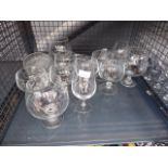 Cage containing brandy snifter's, sherry and wine glasses