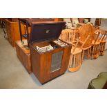 A cased HMV record player, w. 67 cm Poor condition