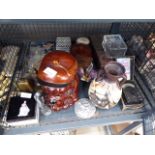 Cage containing souvenir spoons, bells, ornamental figures, dog shaped biscuit barrel, storage