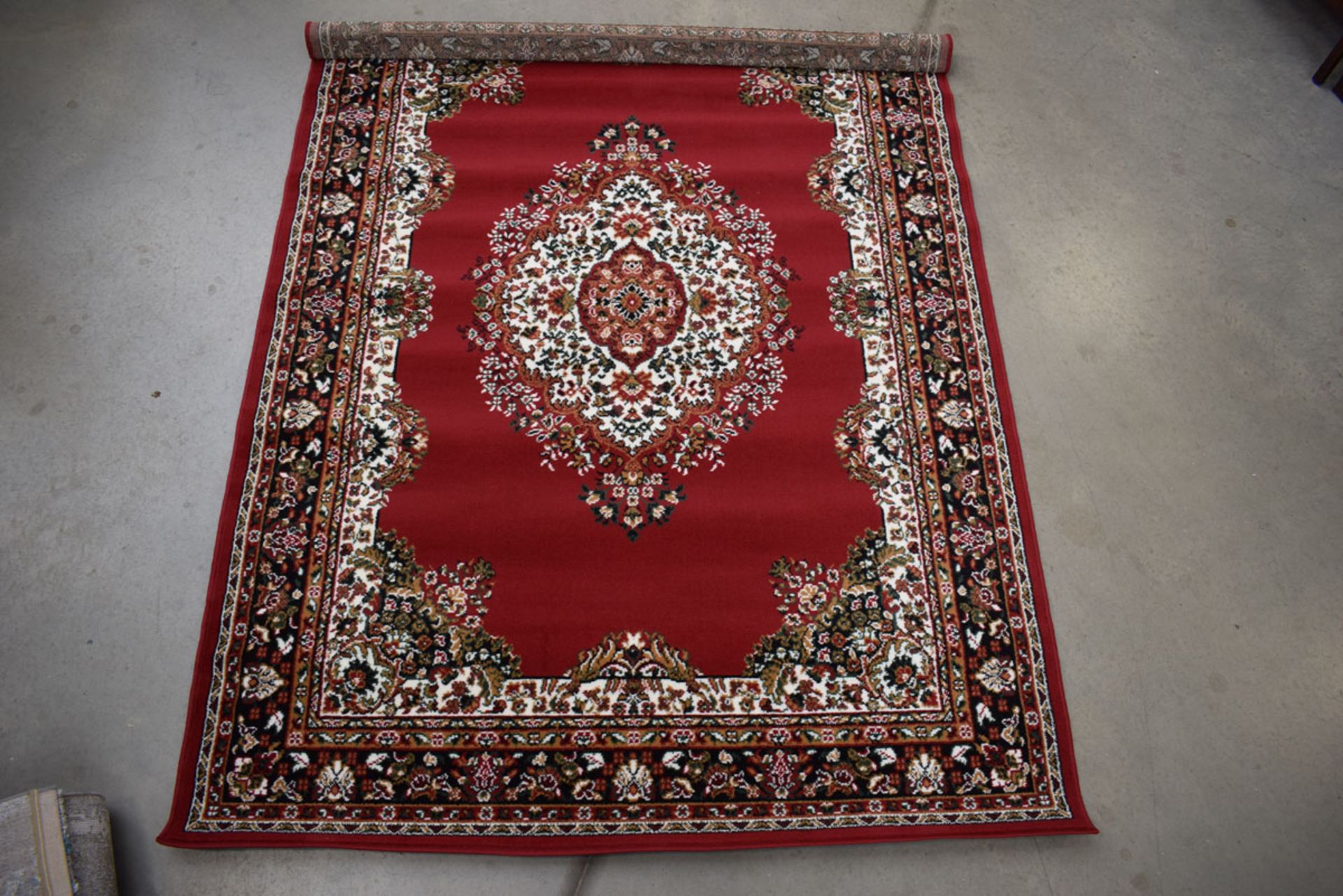 A modern Argos carpet in the Persian style, approx 180 x 230cm