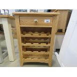 Oak cabinet with single drawer and wine rack (144)