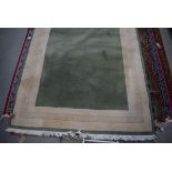 (1) Large carpet in green and cream ground with Grecian style border, approx 200 x 250cm