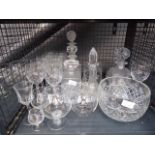 Cage containing brandy snifters, wine glasses, fruit bowl and decanters