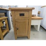 Oak unit with single drawer and single door cupboard