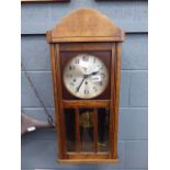 1930's wall clock in oak case