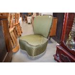 An early/mid 20th century green upholstered bedroom chair