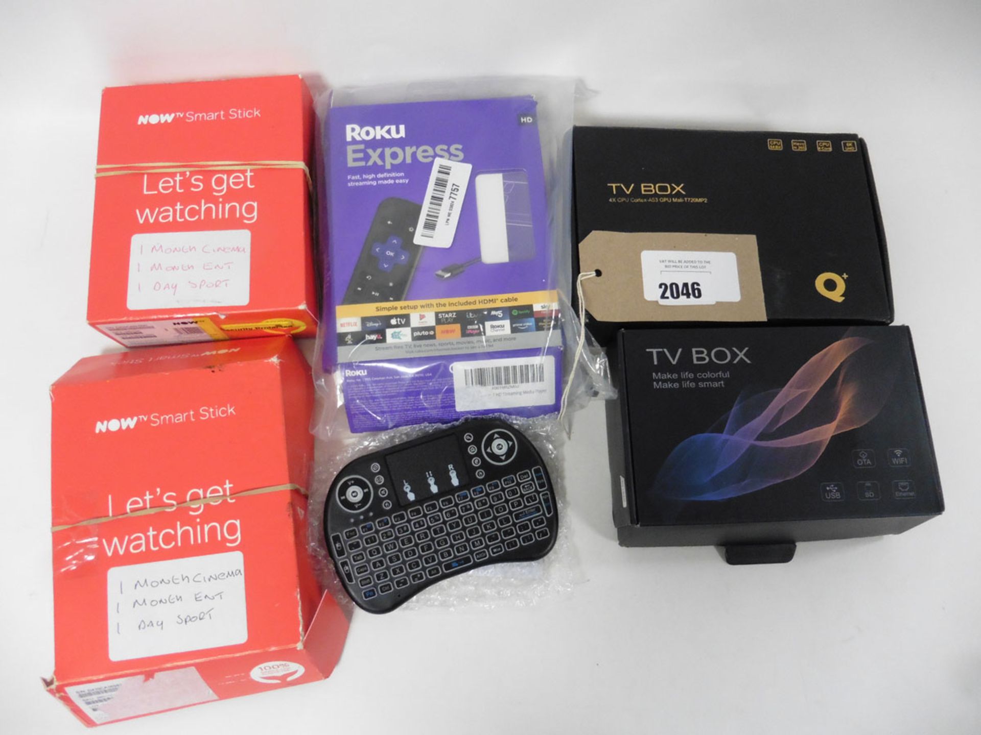 a bag of Roku Express media player, Q+ Tv Box, 4k ultra HD TV box, 2 Now Tv Smart sticks & small