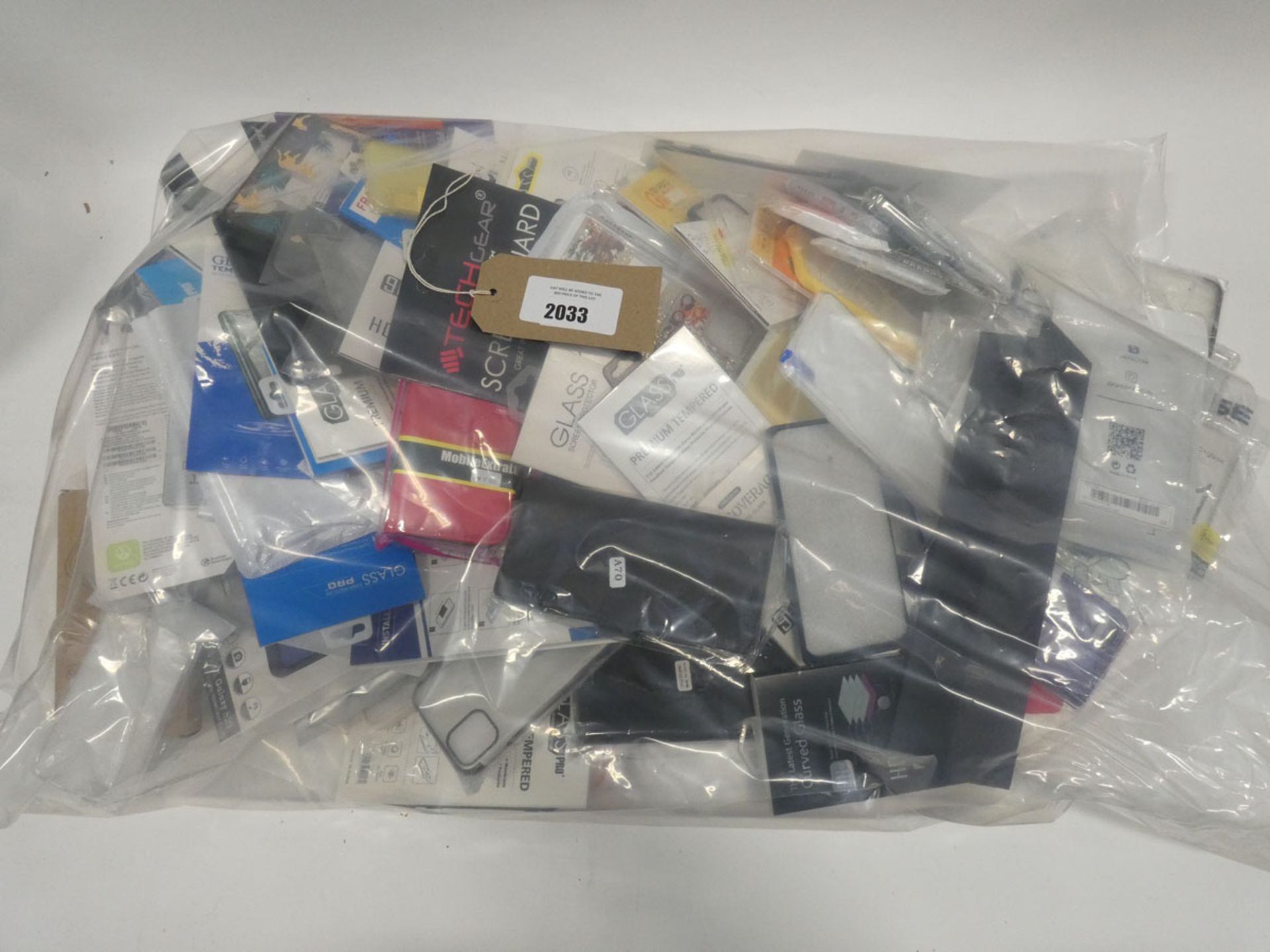 Bag containing quantity of mobile phone cases and covers