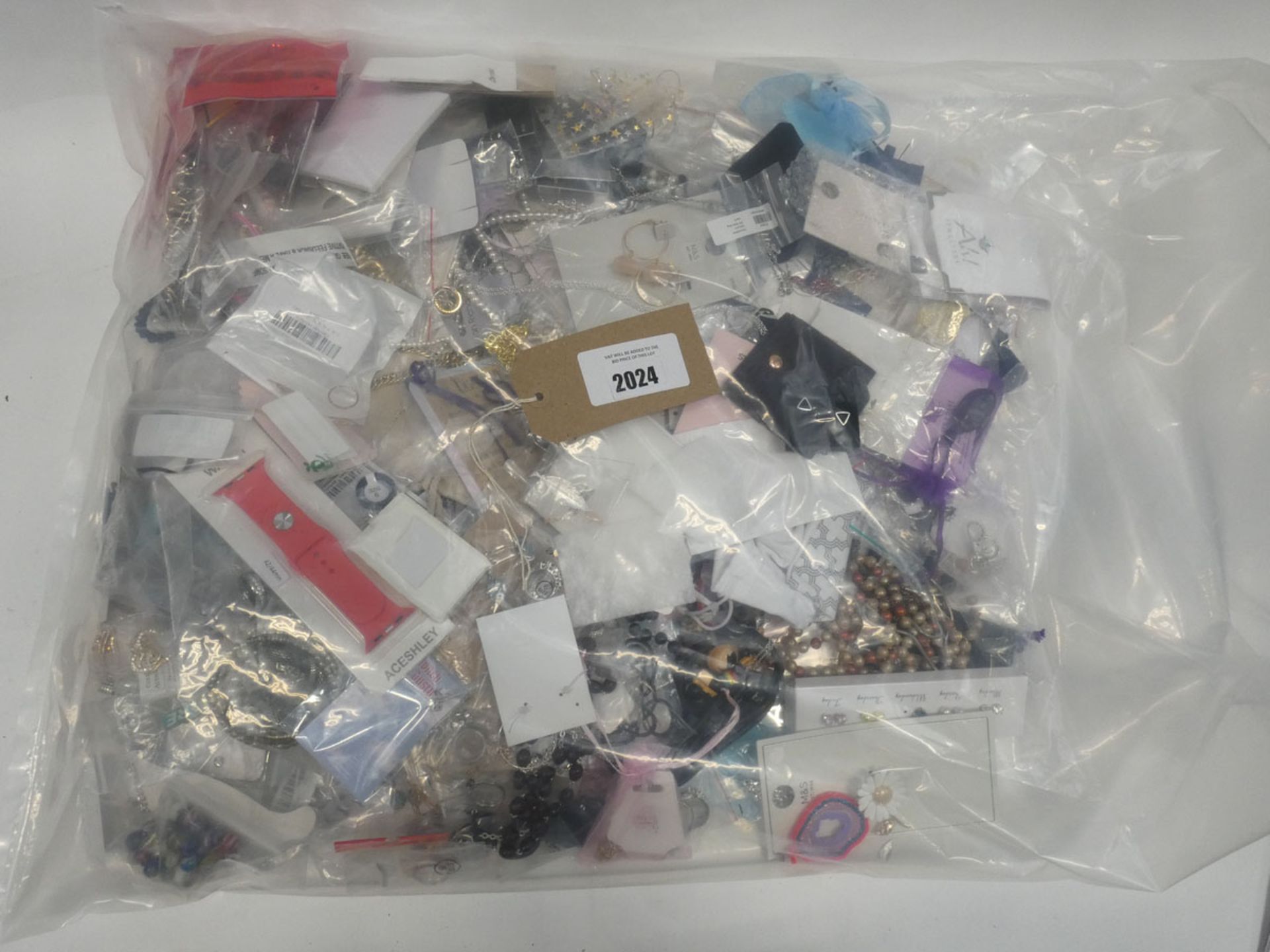 Bag containing quantity of loose costume and dress jewellery