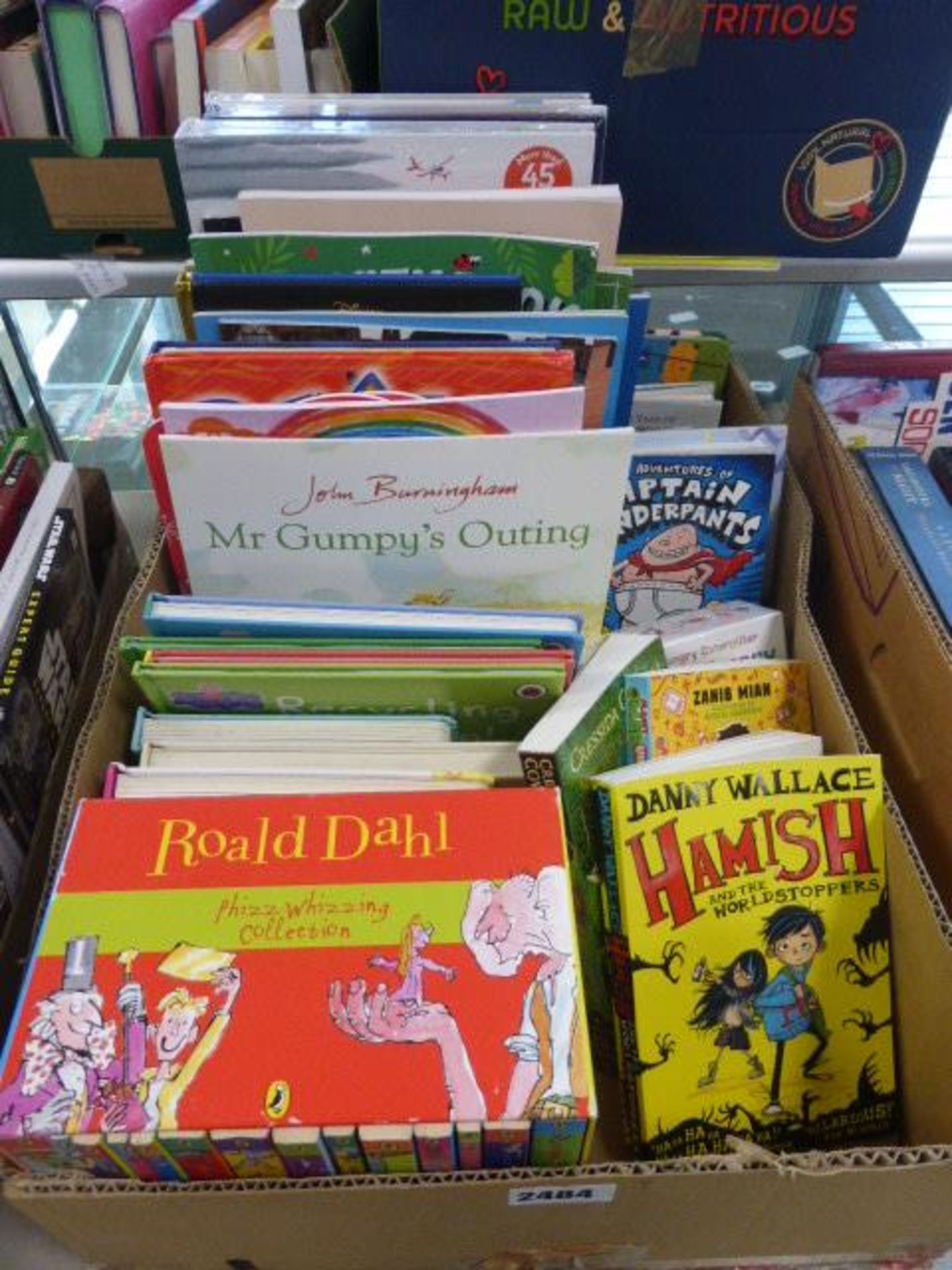 Tray containing various childrens books including a Ronald Dahl collection published by Penguin