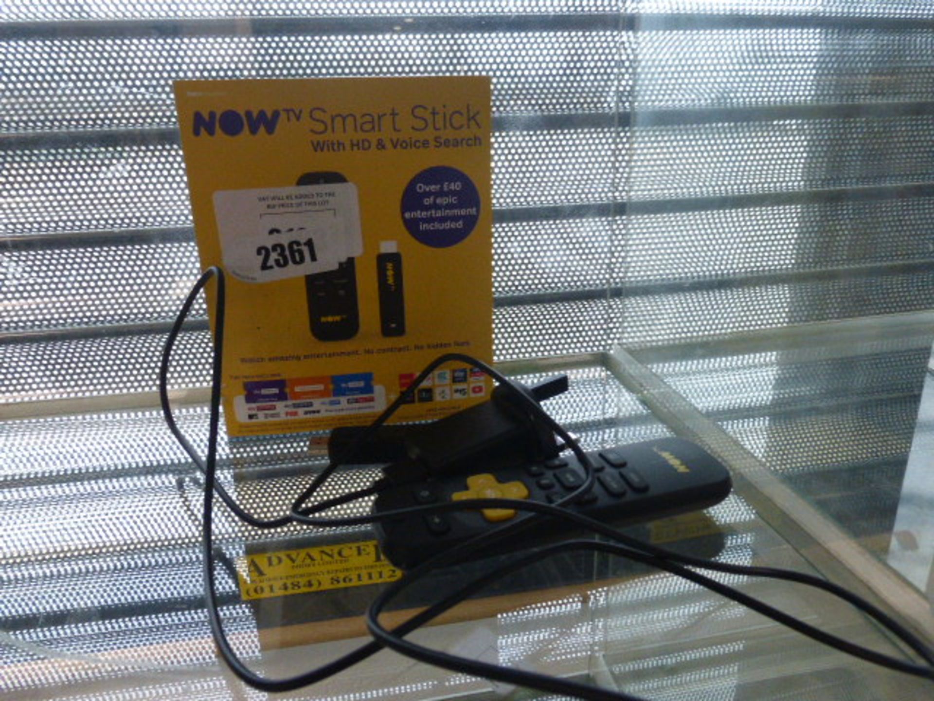 2103 - Now TV Smart Stick in box, with a loose TV Smart Stick and remote