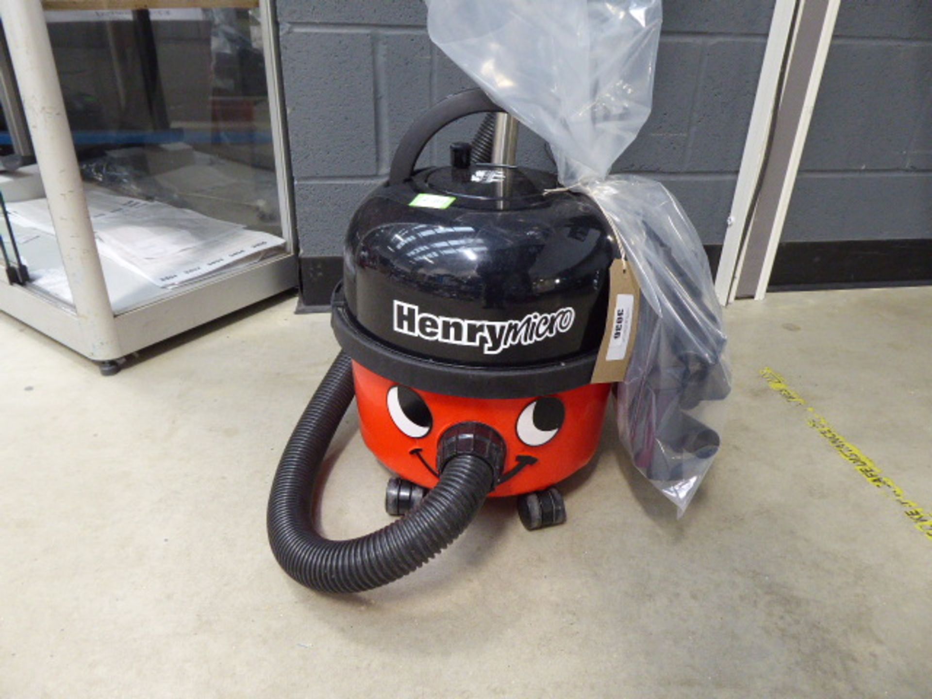 (TN100) Henry micro vacuum cleaner with pole and small bag of accessories - Image 2 of 2