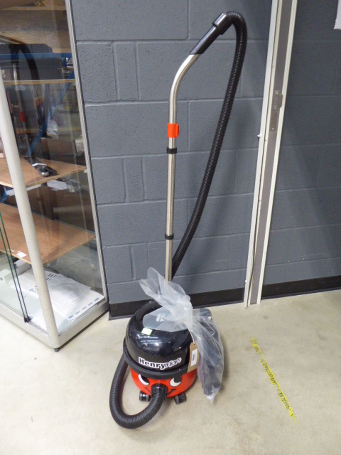 (TN100) Henry micro vacuum cleaner with pole and small bag of accessories