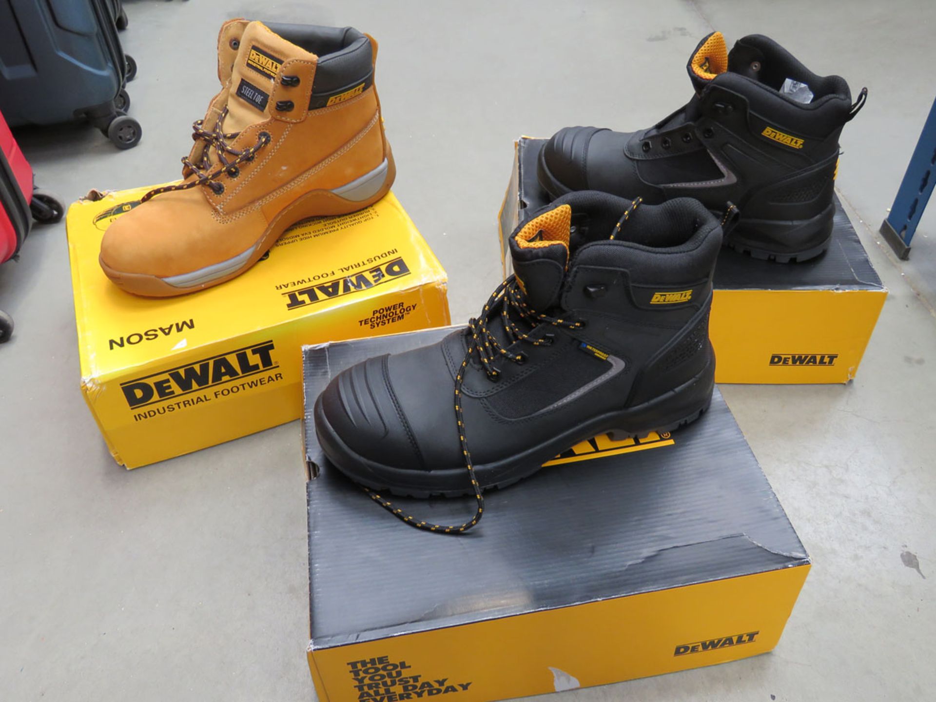 3 boxed pairs of DeWalt safety boots 2 x size 10, 1 x size 12