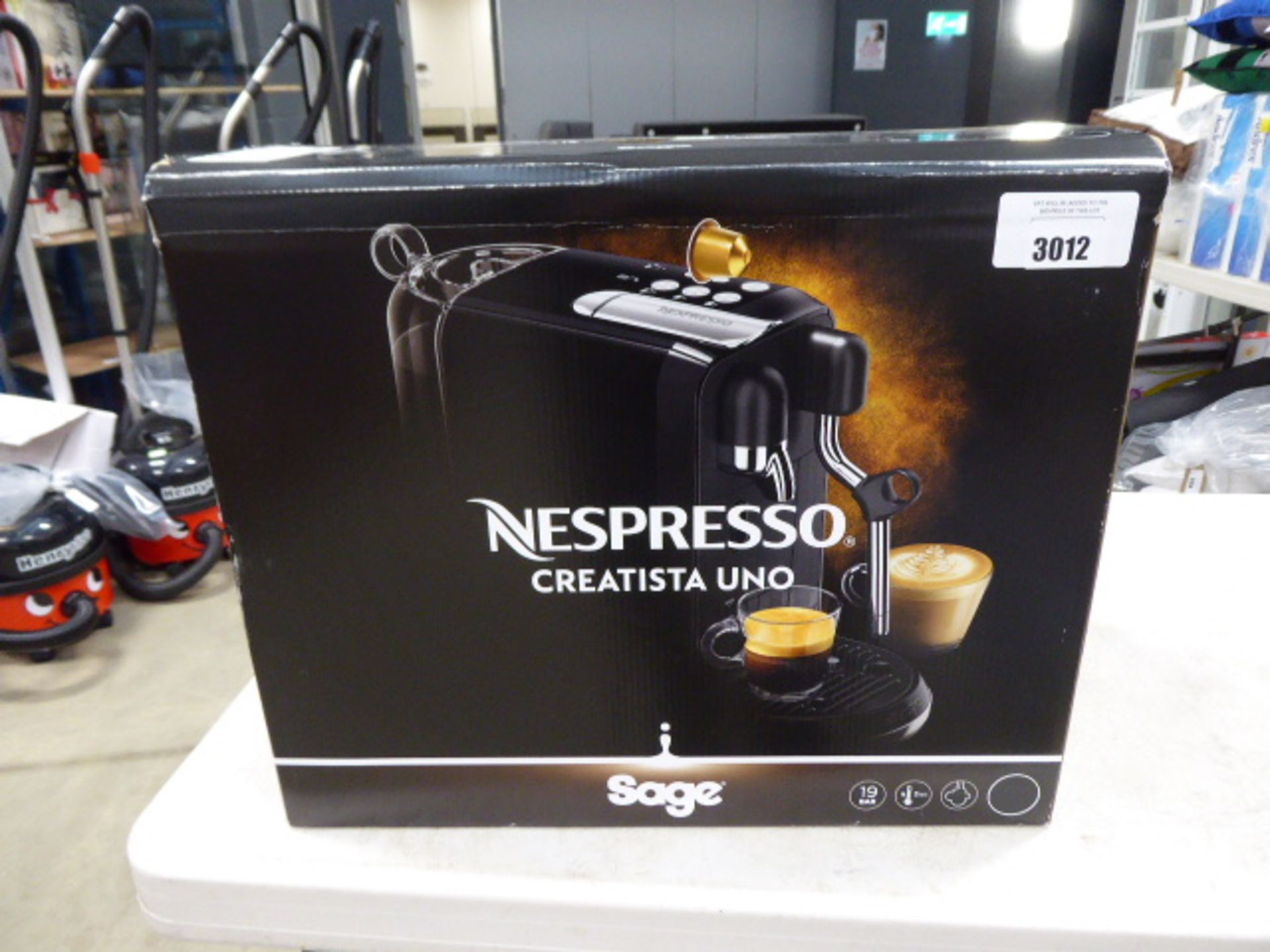 Sage Nexpresso coffee machine plus a box of Nexpresso coffee pods