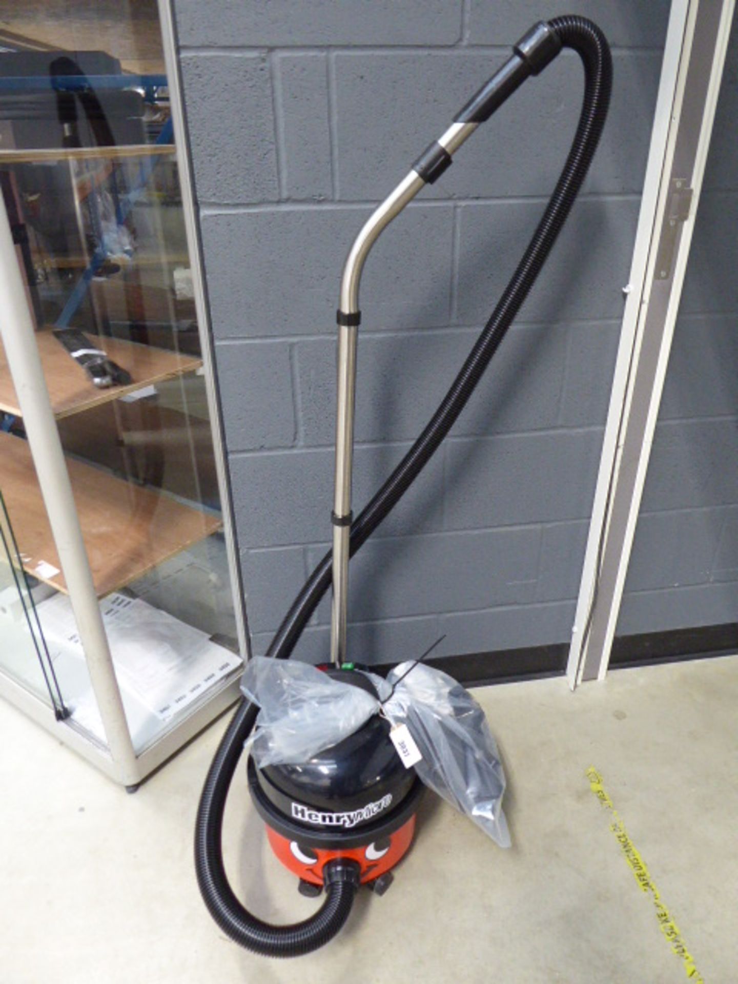 Henry micro vacuum cleaner with pole and small bag of accessories